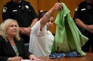 Jury convicts three of four accused in barbershop killing